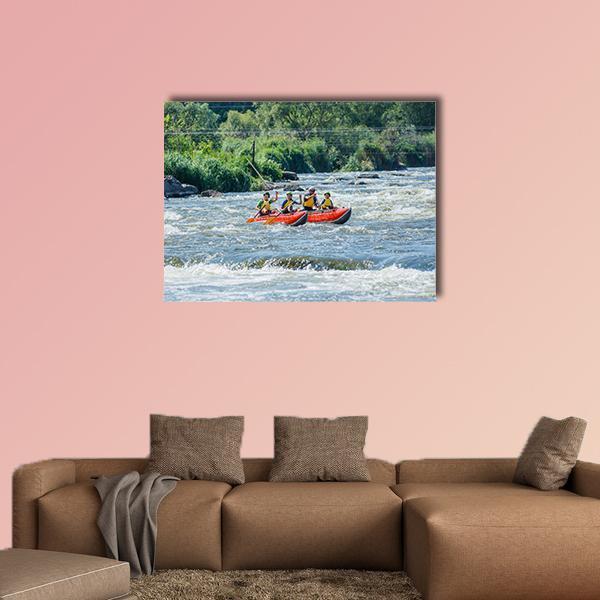Family Rafting on Whitewater Rapids Canvas Wall Art in white, green and blue, single panel hung on a wall