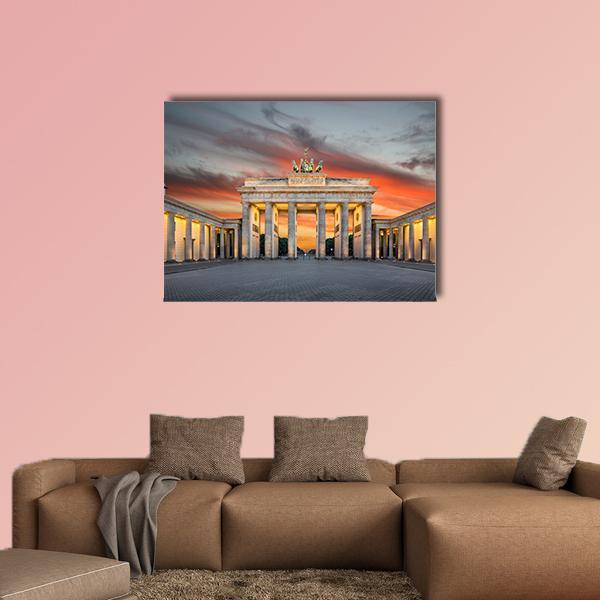 Brandenburg Gate at Dusk Canvas Wall Art in gray, orange and yellow, single panel hung on a wall