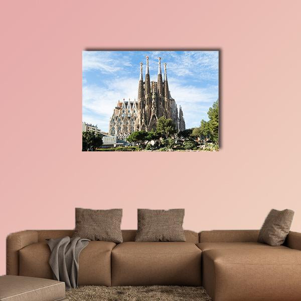 Sagrada Família Cathedral Spires Canvas Wall Art in beige, brown and blue, single panel hung on a wall
