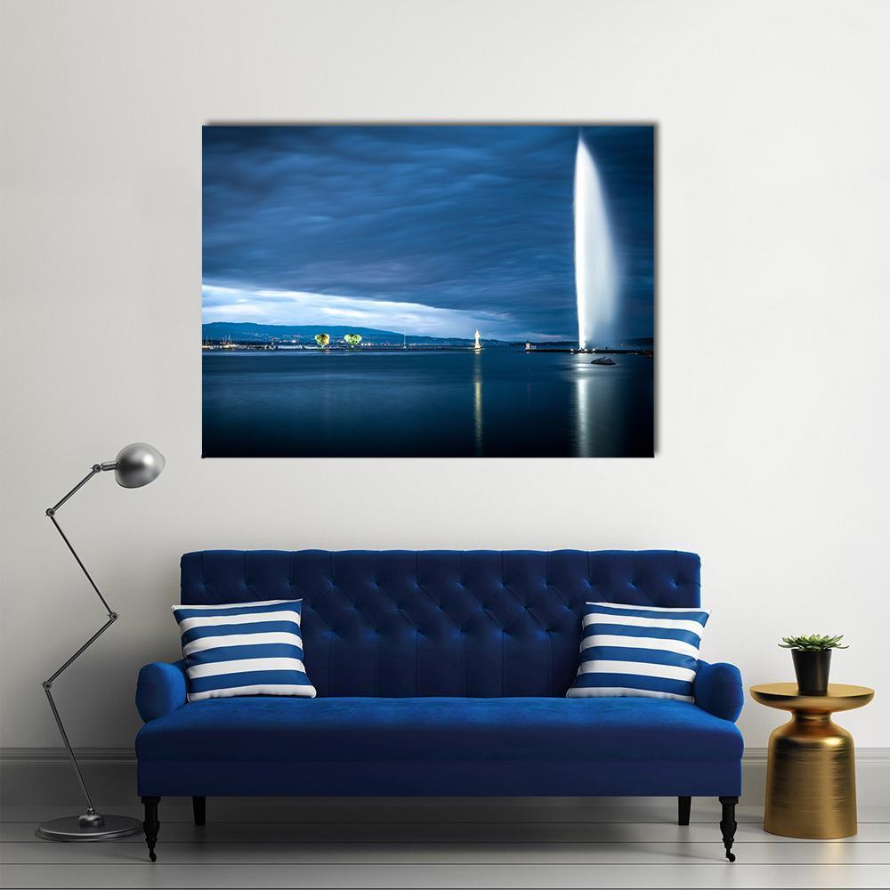 Jet D'eau Over Geneva Lake Canvas Wall Art in white, blue and navy, single panel hung on a wall