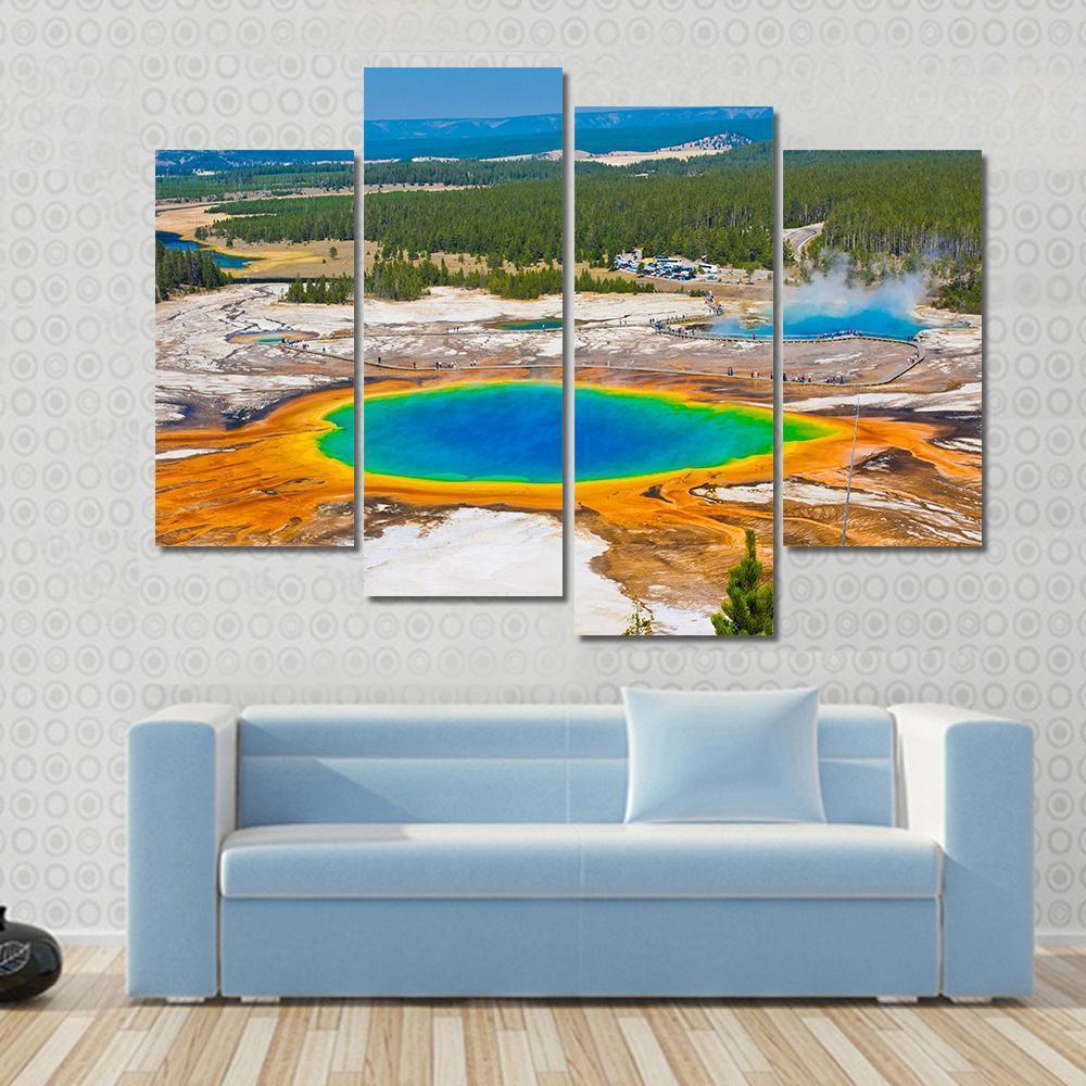 Grand Prismatic Spring Canvas Wall Art in orange, blue and multicolor, 4 panel Pop layout hung on a wall