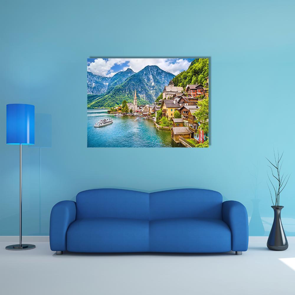 Hallstatt Mountain Village on Alpine Lake Canvas Wall Art in brown, green and blue, single panel hung on a wall