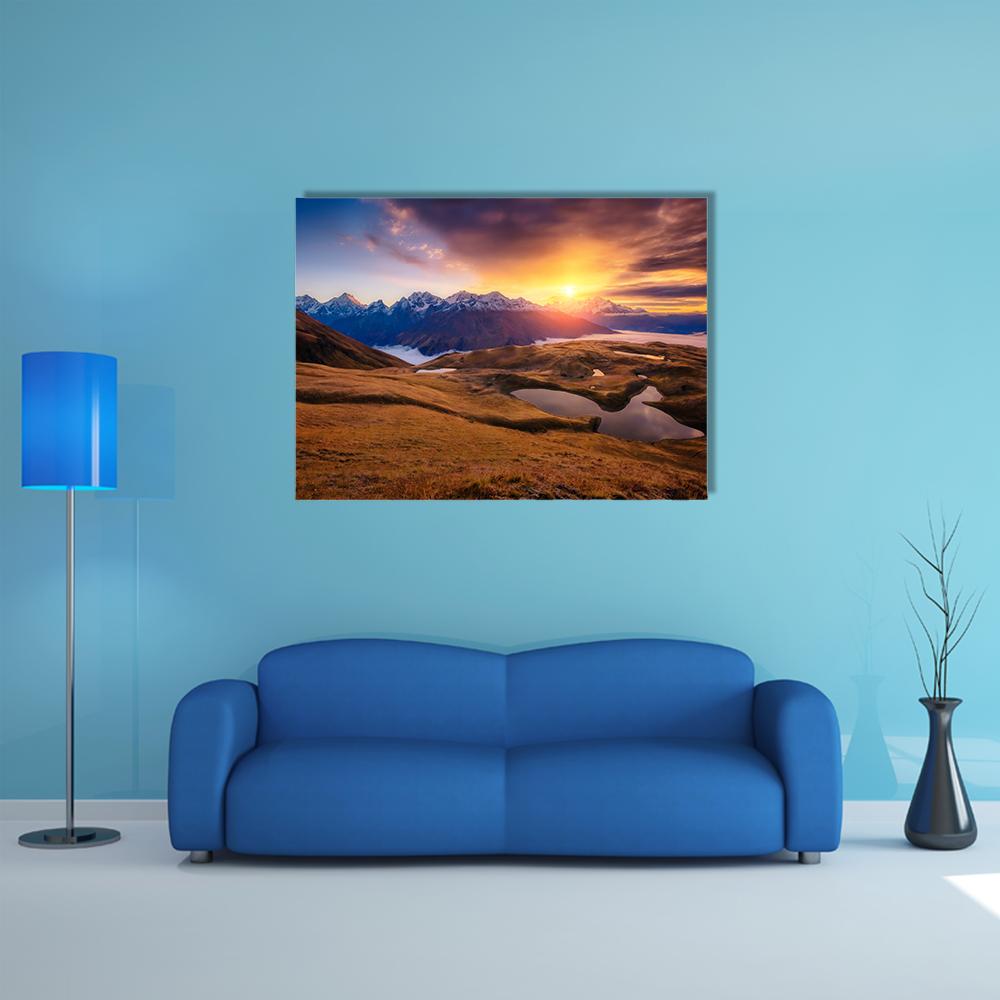 Lake Koruldi at Sunset Canvas Wall Art in brown, orange and blue, single panel hung on a wall
