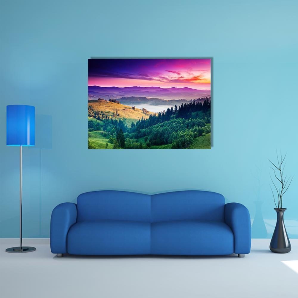Autumn Sunrise Over Misty Mountain Valley Canvas Wall Art in orange, green and purple, single panel hung on a wall