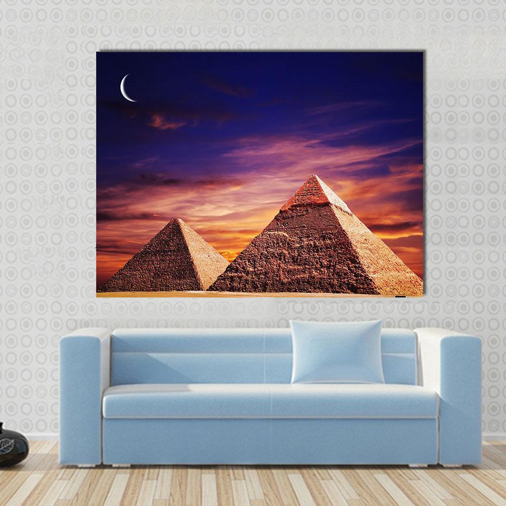 Great Pyramids of Giza at Dusk Canvas Wall Art in brown, orange and purple, single panel hung on a wall