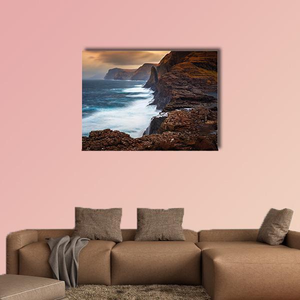Faroe Islands Cliffs with Long-exposure Waves Canvas Wall Art in gray, brown and blue, single panel hung on a wall
