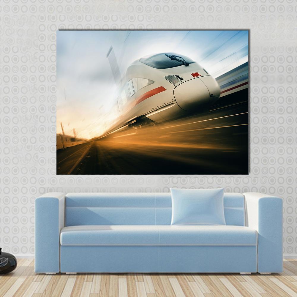 Fast Moving Train Canvas Wall Art in white, gray and blue, single panel hung on a wall