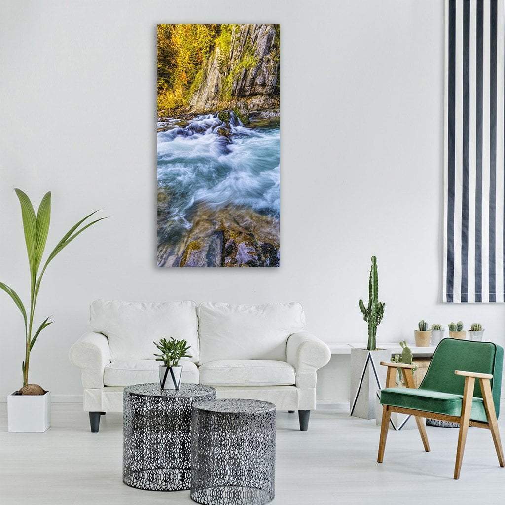 Fast Alpine Stream with Mountains Vertical Canvas Wall Art in gray, green and blue, single vertical panel hung on a wall