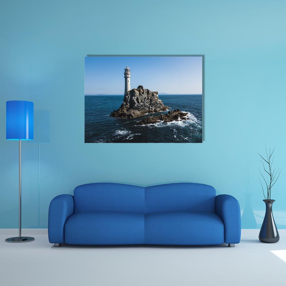Fastnet Lighthouse Canvas Wall Art in gray and blue, single panel hung on a wall