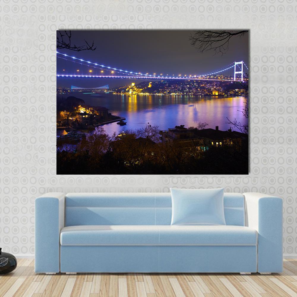 Fatih Sultan Mehmet Bridge Canvas Wall Art in black, gold and blue, single panel hung on a wall