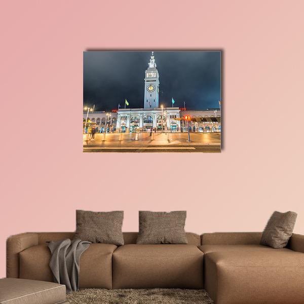 Ferry Building Marketplace at Night Canvas Wall Art in black, yellow and blue, single panel hung on a wall