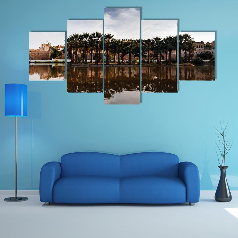 Fes Riverside with Palm Trees Canvas Wall Art in gray, brown and blue, 5 panel Star layout hung on a wall
