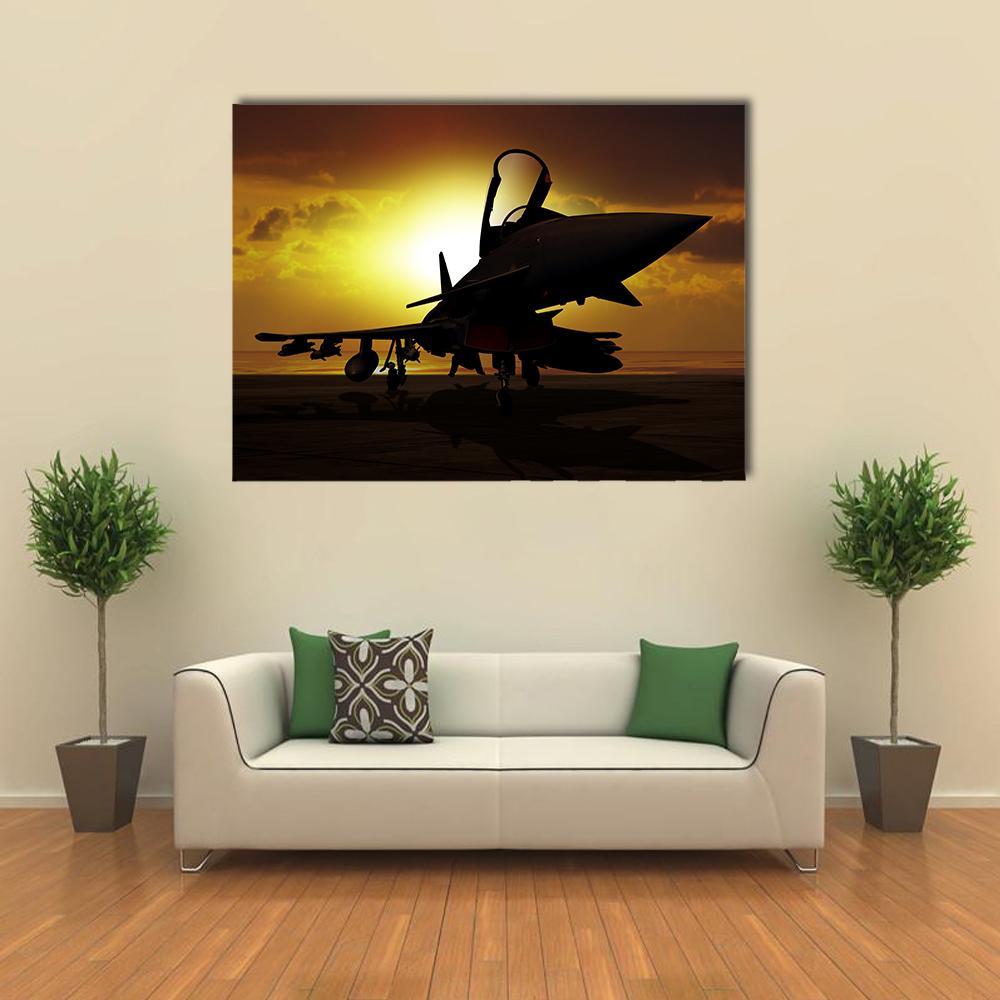 Fighter Jet Silhouette at Sunset Canvas Wall Art in black, orange and yellow, single panel hung on a wall