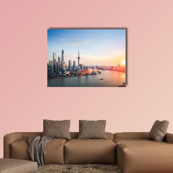 Shanghai Skyline at Dusk Canvas Wall Art in orange, yellow and blue, single panel hung on a wall