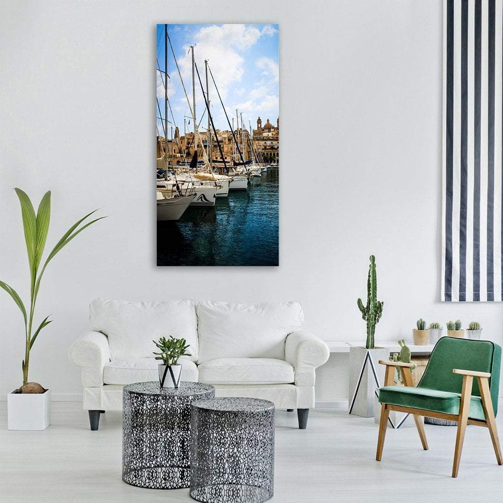 Fishing Boat in Marsaxlokk Vertical Canvas Wall Art in white, beige and blue, single vertical panel hung on a wall