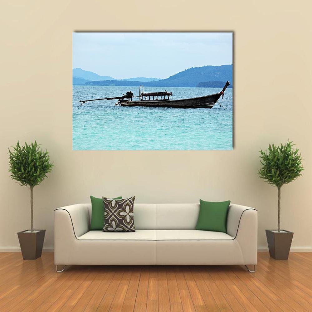Thai Long-tail Boat on Turquoise Sea Canvas Wall Art in green and blue, single panel hung on a wall