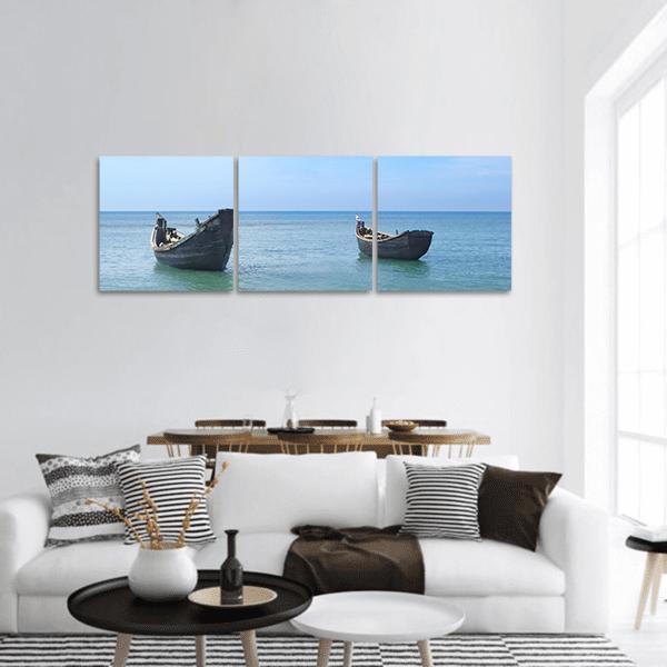 Two Fishing Boats on Saint Martins Island Panoramic Canvas Wall Art in white and blue, hung on a wall