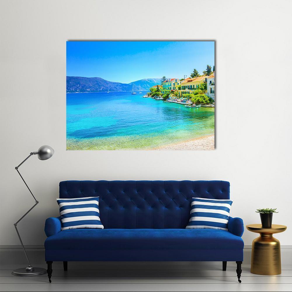 Fiskardo Village, Kefalonia Canvas Wall Art in yellow, green and blue, single panel hung on a wall