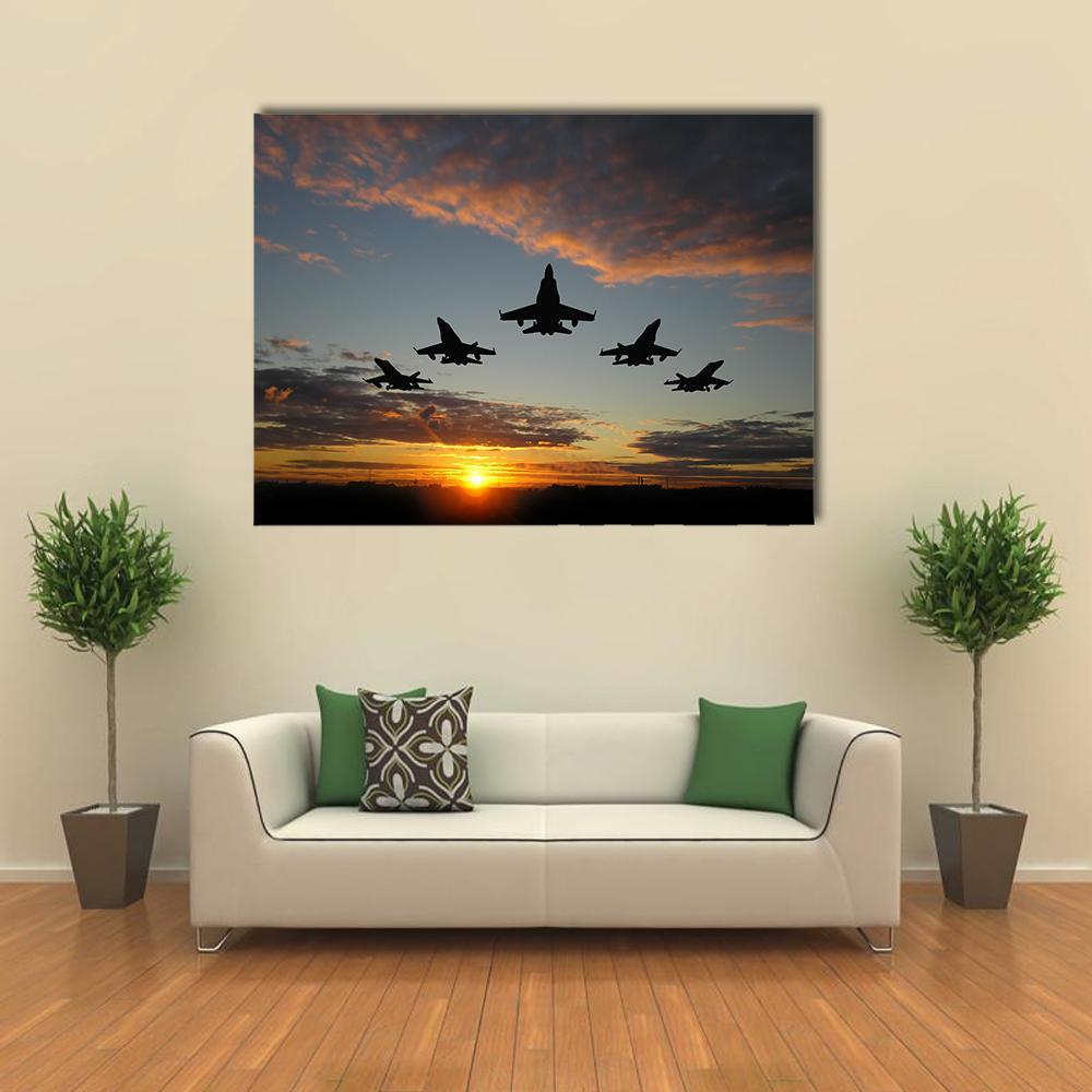 Five Jets Over Orange Sunset Canvas Wall Art in black, orange and blue, single panel hung on a wall