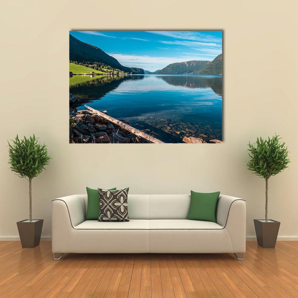 Fjord and Mountains in Norway Canvas Wall Art in brown, green and blue, single panel hung on a wall