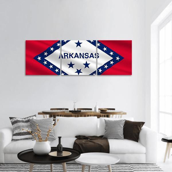 Waving Arkansas State Flag Panoramic Canvas Wall Art in white, red and blue, hung on a wall