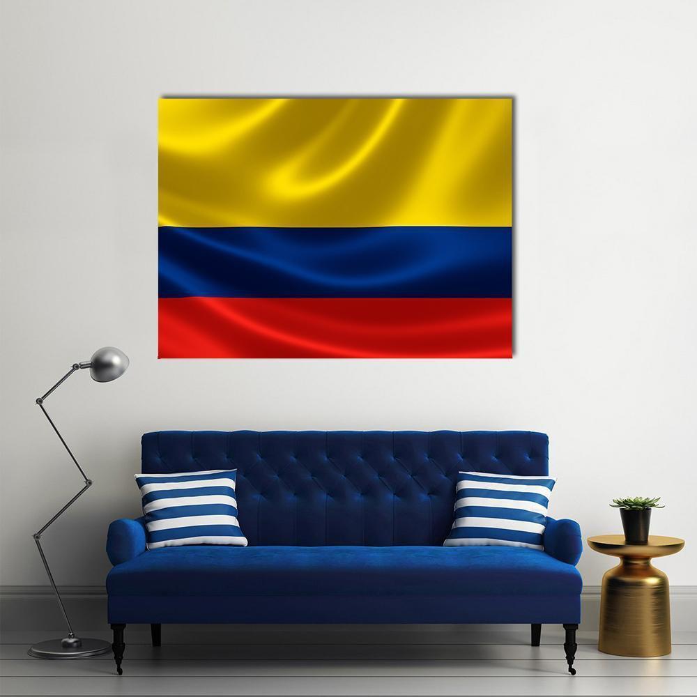 Colombian Flag in Motion Canvas Wall Art in red, yellow and blue, single panel hung on a wall