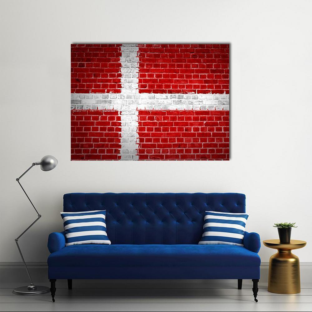 Danish Flag on Weathered Brick Canvas Wall Art in white and red, single panel hung on a wall