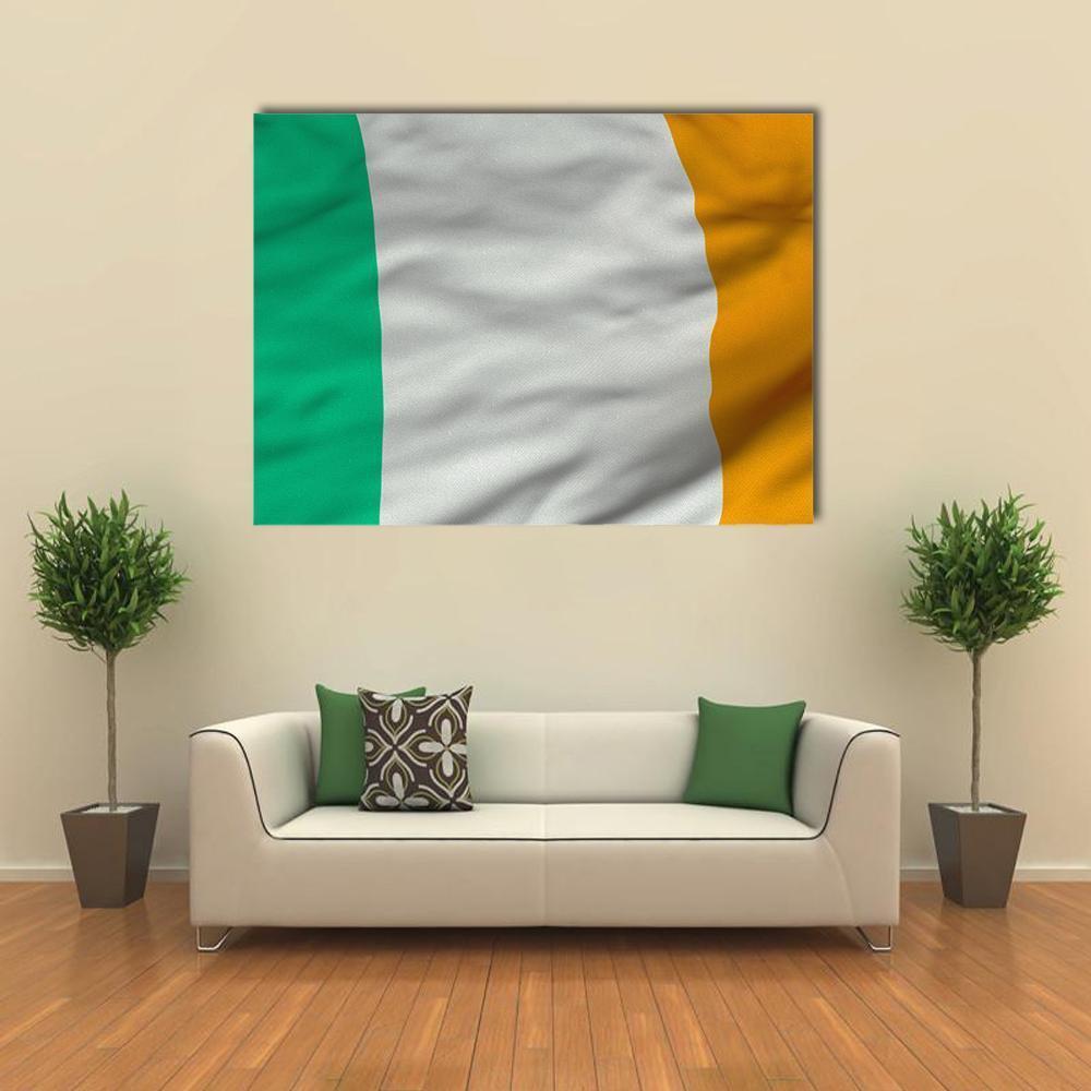 Irish Flag with Waving Fabric Canvas Wall Art in white, orange and green, single panel hung on a wall