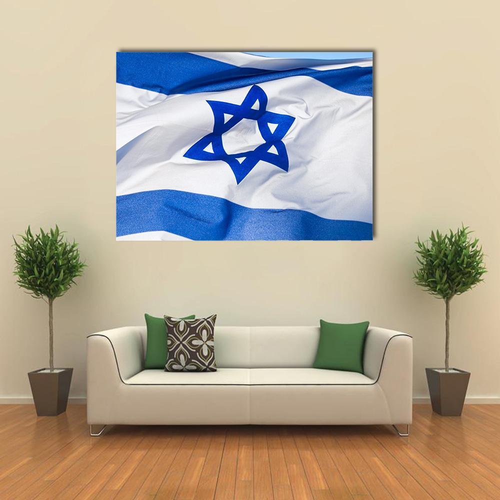 Israeli Flag Close-up with Star of David Canvas Wall Art in white and blue, single panel hung on a wall