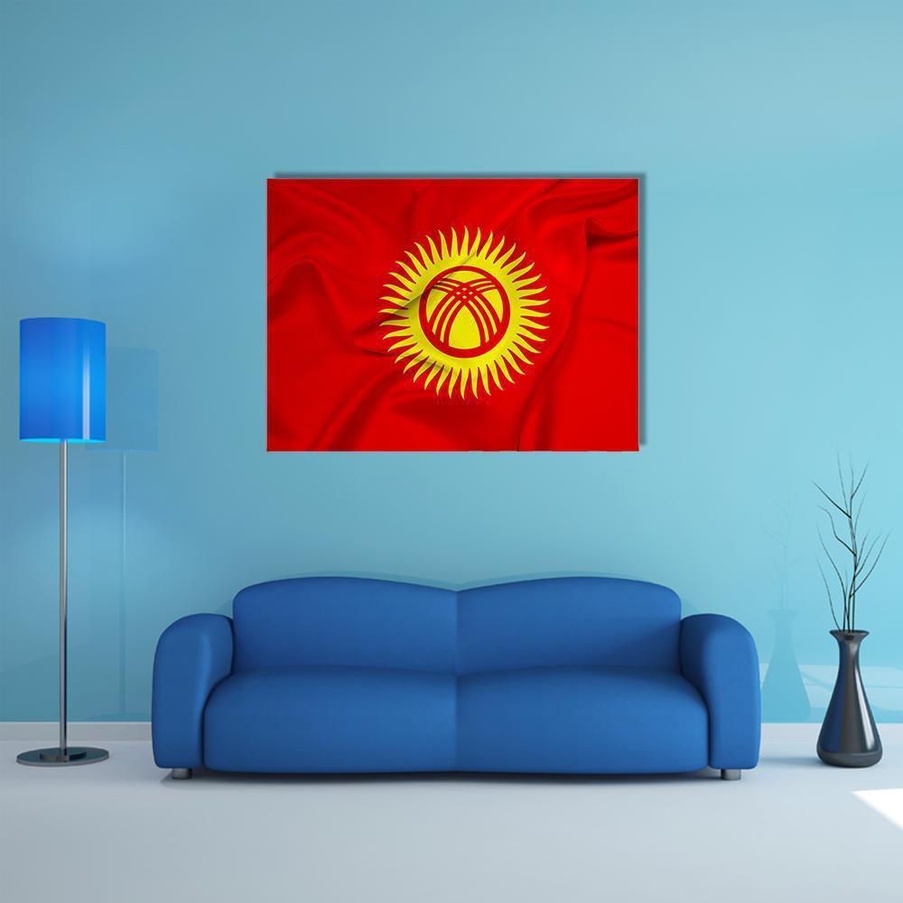 Kyrgyzstan Flag Canvas Wall Art in red and yellow, single panel hung on a wall