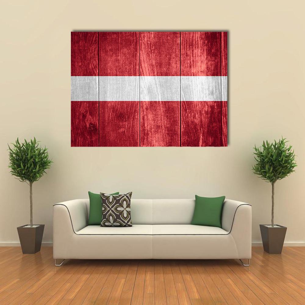 Latvian Flag with Wood Grain Texture Canvas Wall Art in white and red, single panel hung on a wall