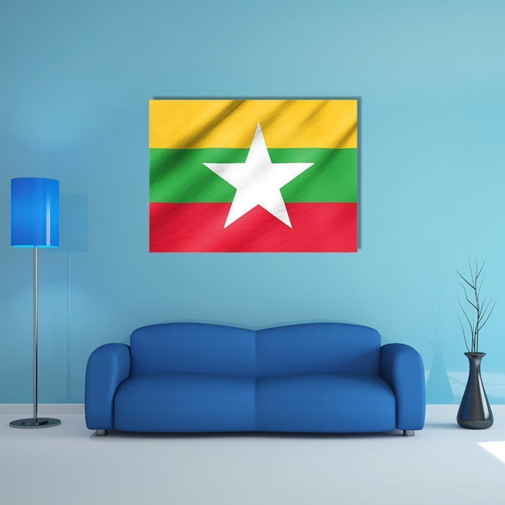 Myanmar Flag with Center Star and Rippling Fabric Canvas Wall Art in red, yellow and green, single panel hung on a wall