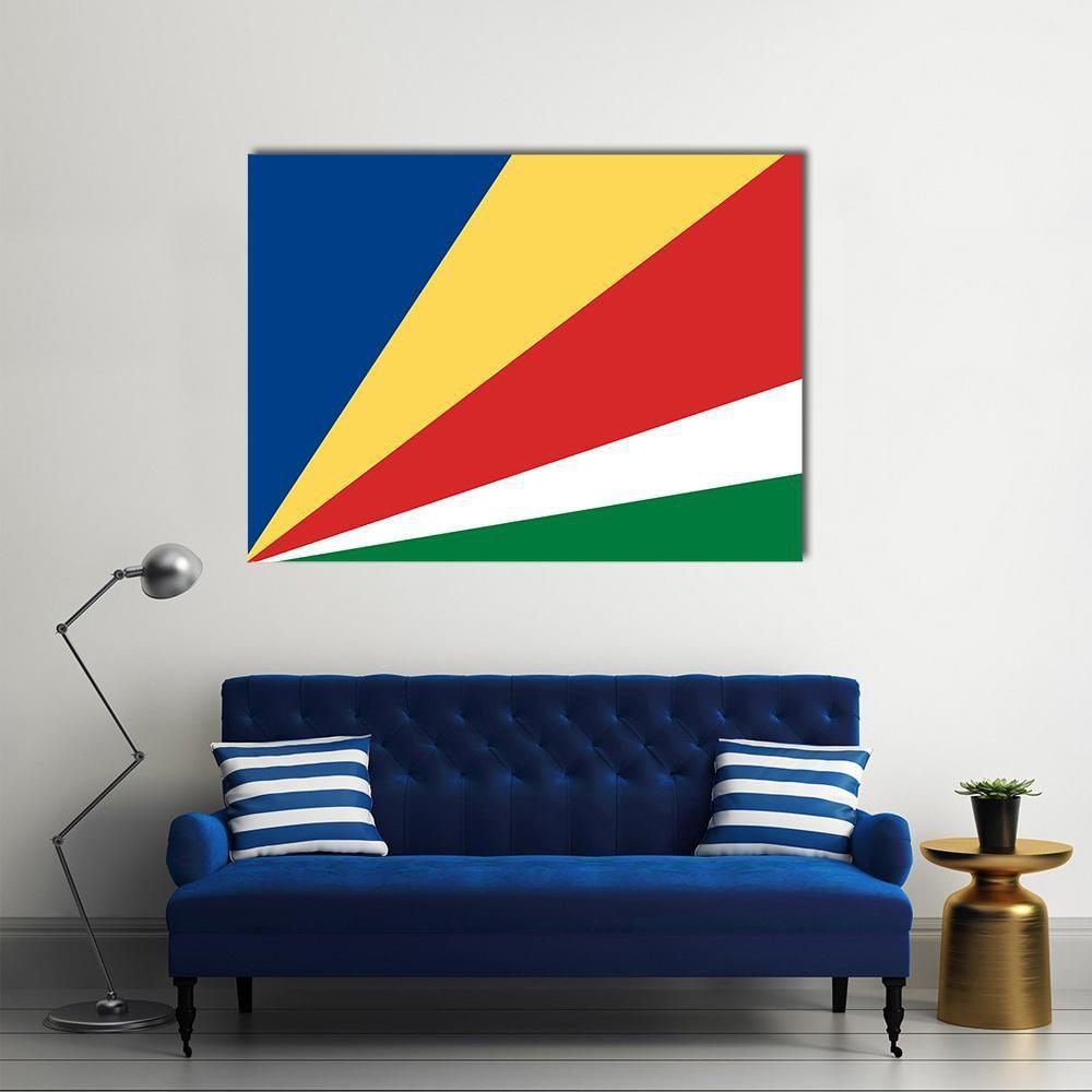 Seychelles Flag Geometric Stripes Canvas Wall Art in red, yellow and blue, single panel hung on a wall