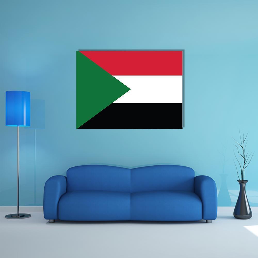 Sudan Flag Geometric Print Canvas Wall Art in white, red and green, single panel hung on a wall