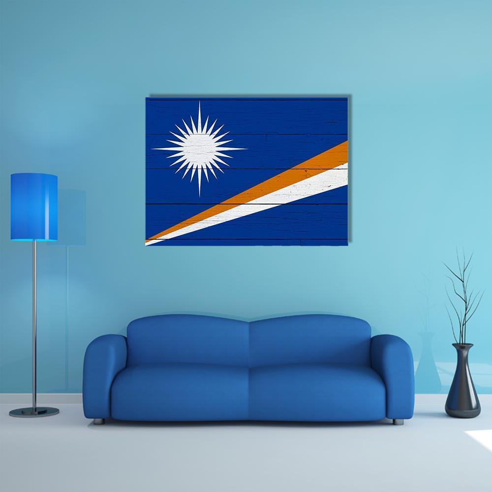 Marshall Islands Flag on Wooden Planks Canvas Wall Art in white, orange and blue, single panel hung on a wall