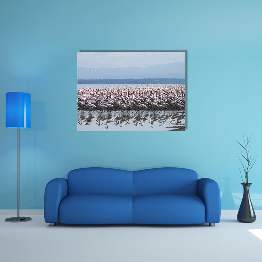 Flamingos at Lake Nakuru Canvas Wall Art in white, blue and pink, single panel hung on a wall