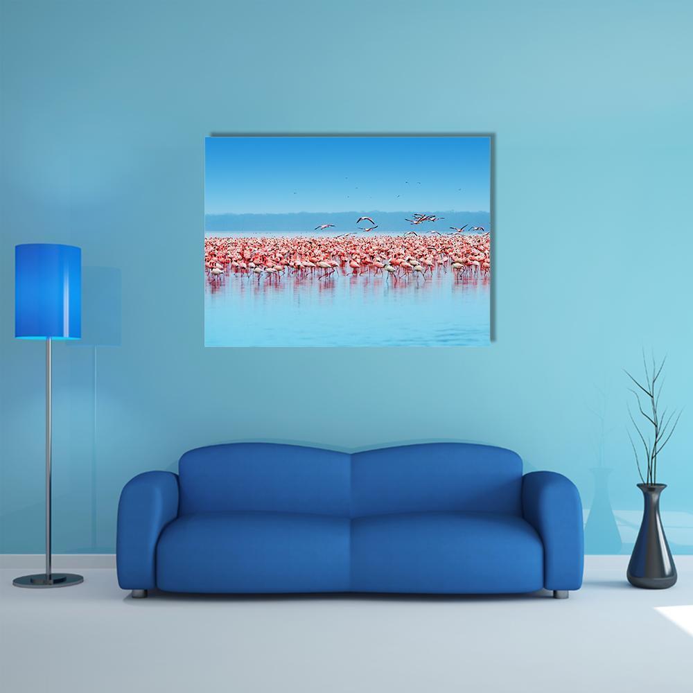 Flock of Flamingos at Lake Nakuru Canvas Wall Art in blue and pink, single panel hung on a wall