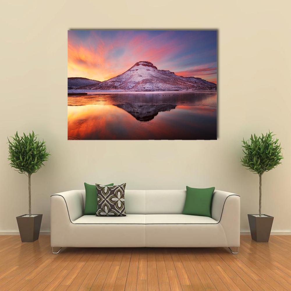 Flatiron Reservoir Winter Sunset Reflection Canvas Wall Art in orange, blue and pink, single panel hung on a wall