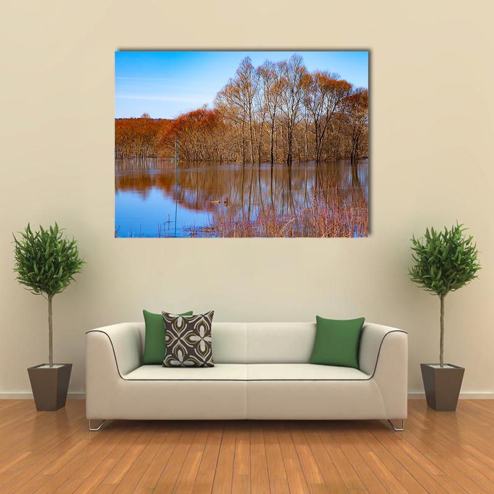 Flood on River Oka Canvas Wall Art in brown, orange and blue, single panel hung on a wall