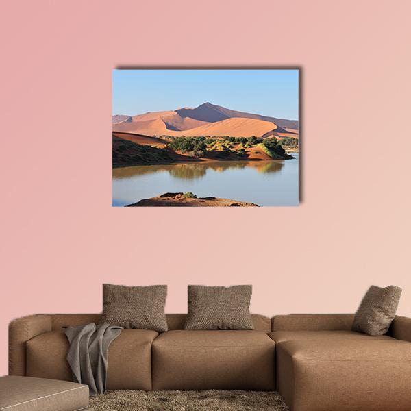 Flooded Sossusvlei Namib Dunes Canvas Wall Art in brown, orange and blue, single panel hung on a wall