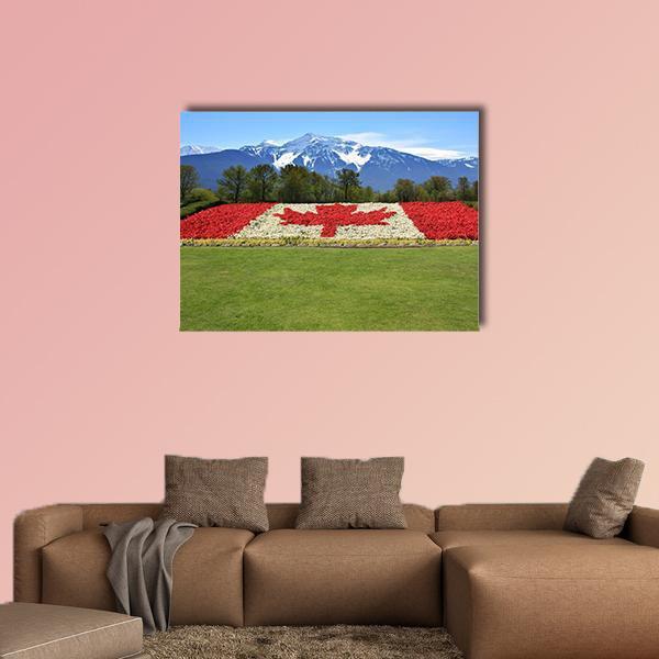 Canadian Flag Made of Flowers Canvas Wall Art in white, red and green, single panel hung on a wall