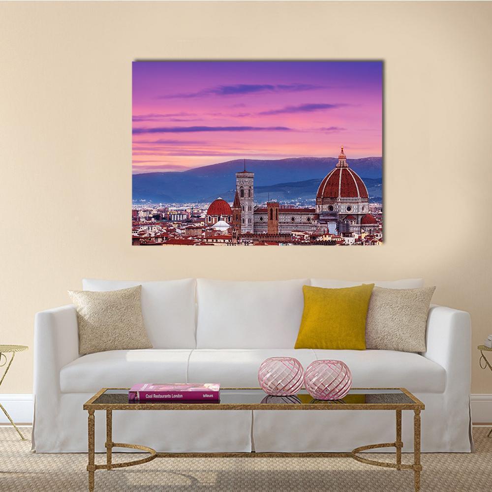 Florence Skyline at Sunset Canvas Wall Art in orange, purple and pink, single panel hung on a wall