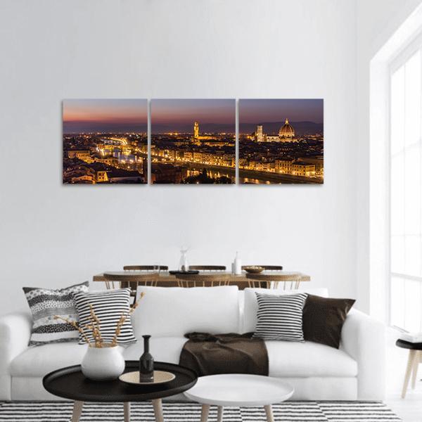 Florence Skyline at Twilight Panoramic Canvas Wall Art in gold, orange and purple, hung on a wall