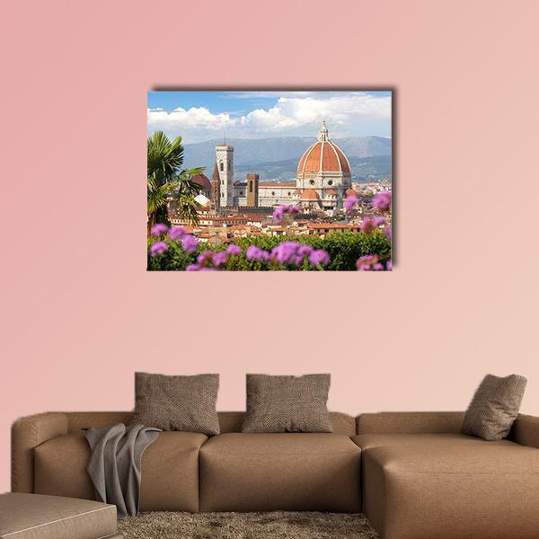 Florence in Spring Canvas Wall Art in orange, blue and pink, single panel hung on a wall