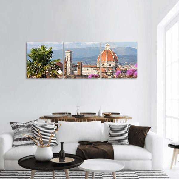 Florence in Spring Panoramic Canvas Wall Art in orange, green and blue, hung on a wall