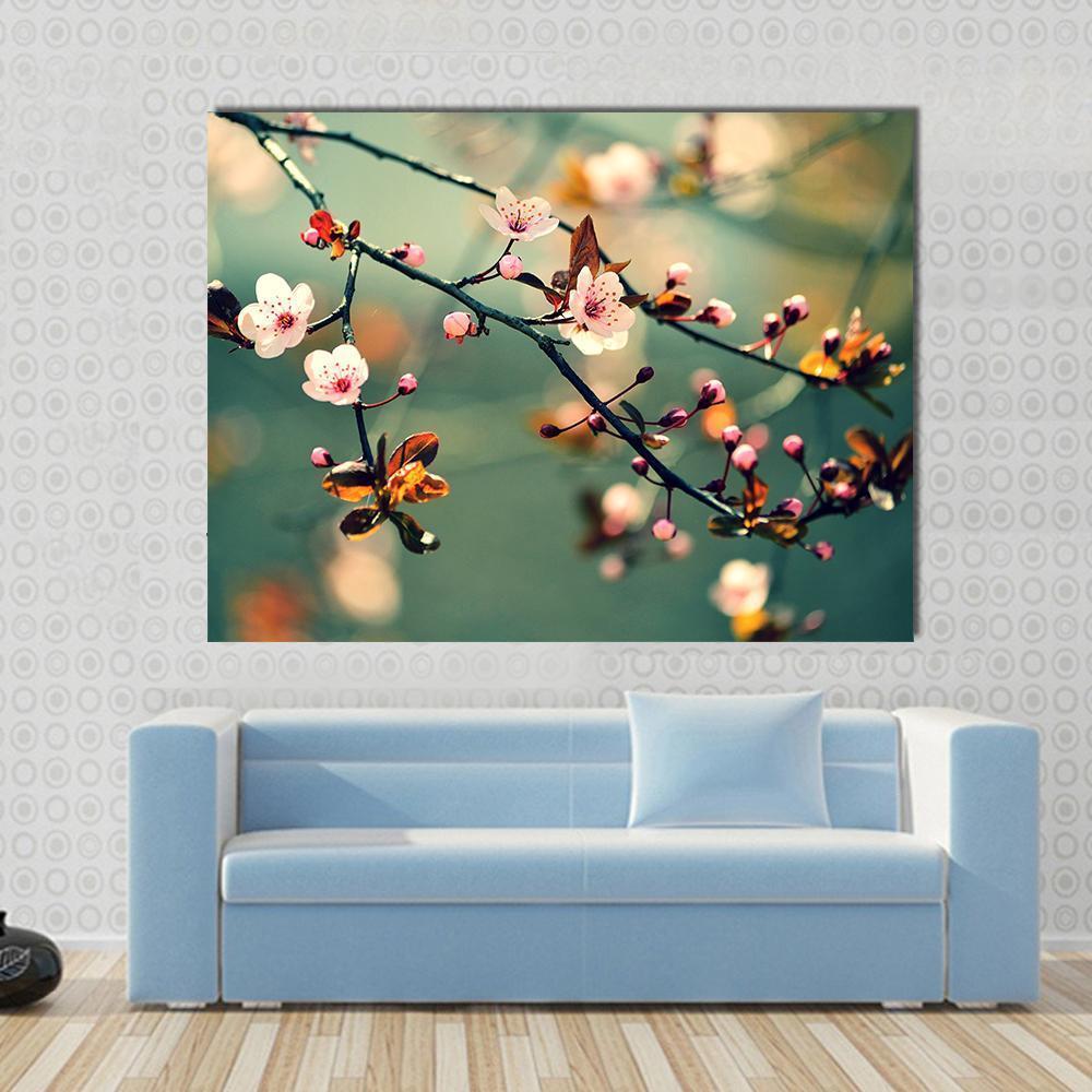 Flowering Japanese Cherry Canvas Wall Art in brown, green and pink, single panel hung on a wall