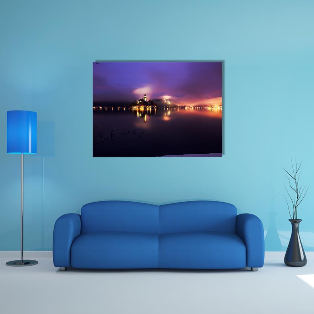 Foggy Dusk Over Island Church on Lake Canvas Wall Art in black, yellow and purple, single panel hung on a wall