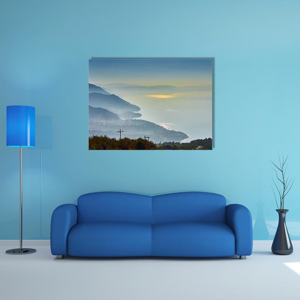 Foggy Morning at the Lake Canvas Wall Art in gray, yellow and blue, single panel hung on a wall