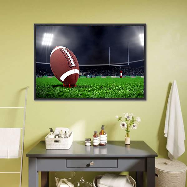 Football on Green Field Canvas Wall Art in black, brown and green, framed canvas, product view on a white background