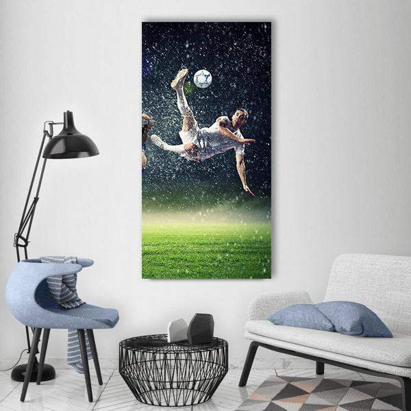 Mid-air Bicycle Kick Soccer Player Vertical Canvas Wall Art in black, white and green, single vertical panel hung on a wall